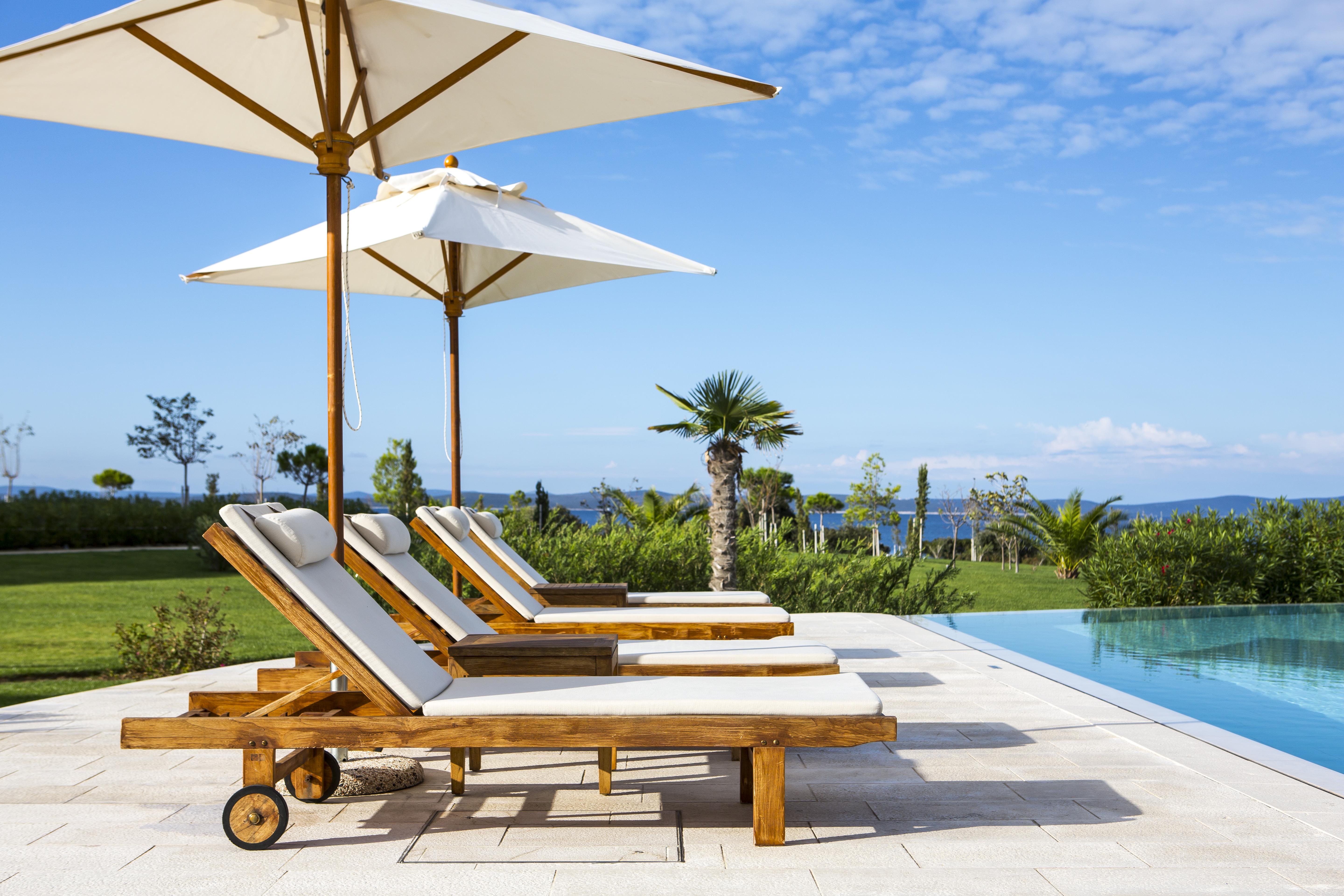 Falkensteiner Hotel & Spa Iadera Petrcane Εξωτερικό φωτογραφία A poolside lounge chair